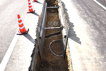 写真：且来Ⅴ遺跡発掘調査風景（北から）